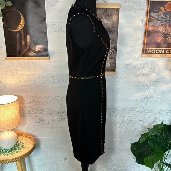 Cache NWT black dress with gold tone rock studs in sz 6. Stretchy.