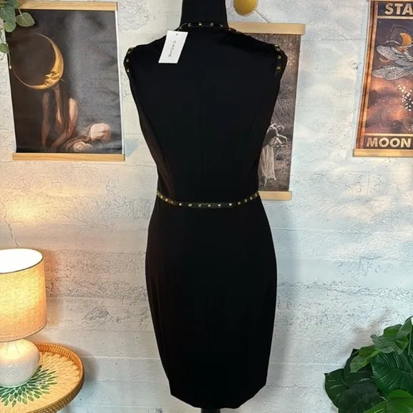 Cache NWT black dress with gold tone rock studs in sz 6. Stretchy.