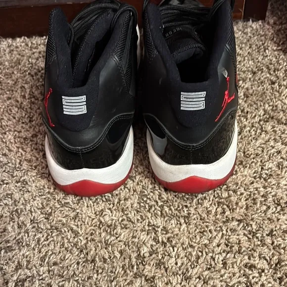 Jordan Black and Red Sneakers with Glossy Finish