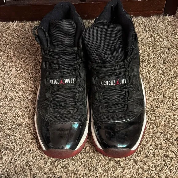 Jordan Black and Red Sneakers with Glossy Finish