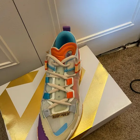 Jordan Purple and Orange Sneakers with Retro Design