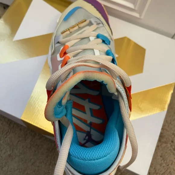 Jordan Purple and Orange Sneakers with Retro Design