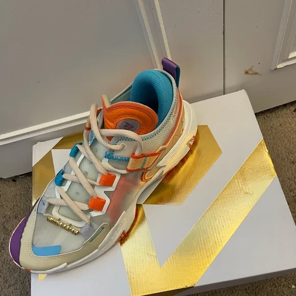 Jordan Purple and Orange Sneakers with Retro Design