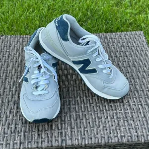 New Balance Gray and Blue Sneakers with Versatile Design