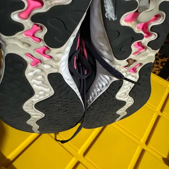 Nike Black and Pink Athletic Shoes with Mesh Upper