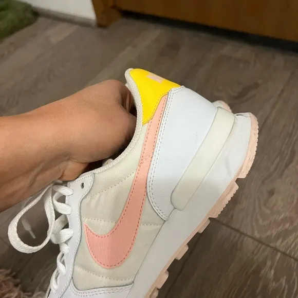 Nike Woman’s Internationalist White and Arctic Orange Sneakers