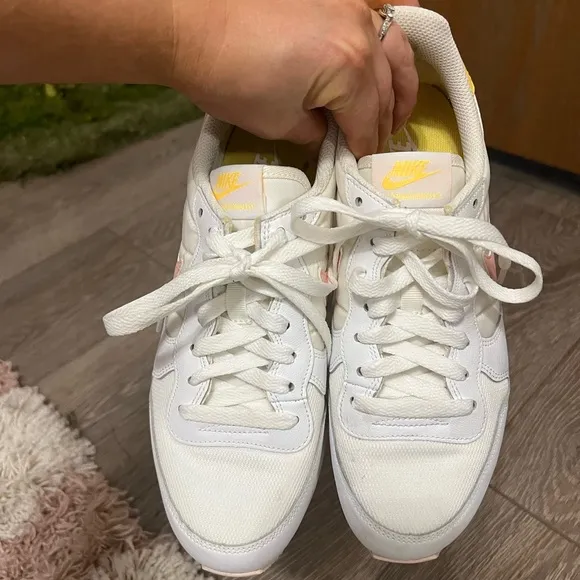 Nike Woman’s Internationalist White and Arctic Orange Sneakers