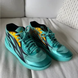 Puma Teal and Gold Athletic Shoes