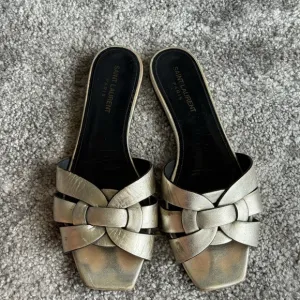 Saint Laurent Women's Silver Slide Sandals tribute