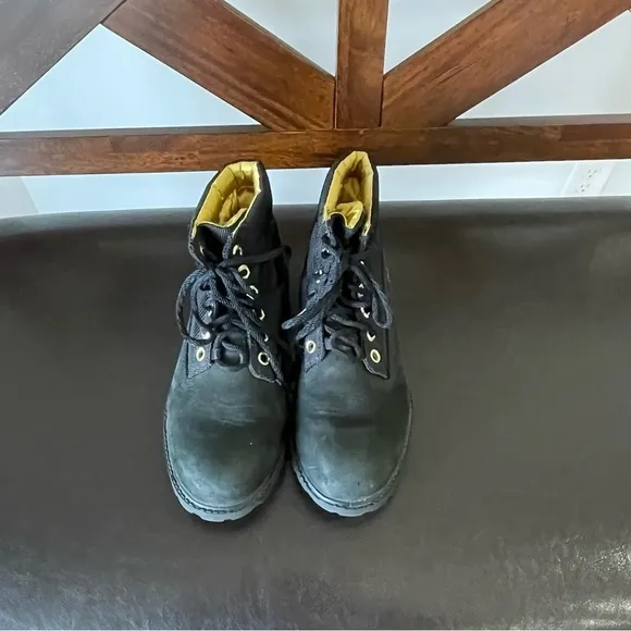 Timberland boots in a size 5 black and gold