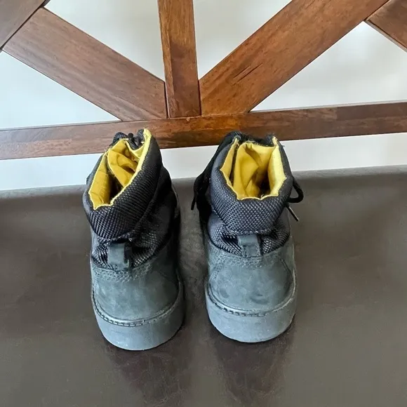 Timberland boots in a size 5 black and gold