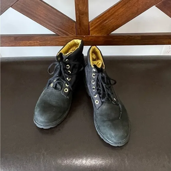 Timberland boots in a size 5 black and gold