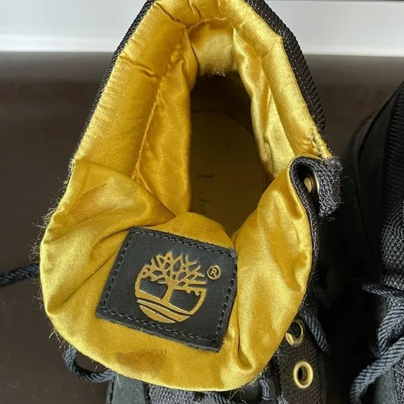 Timberland boots in a size 5 black and gold
