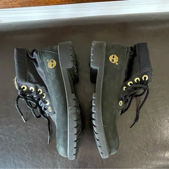 Timberland boots in a size 5 black and gold